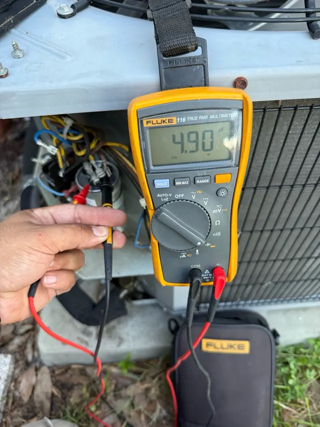 Electrical measurement documented during HVAC maintenance in Largo.